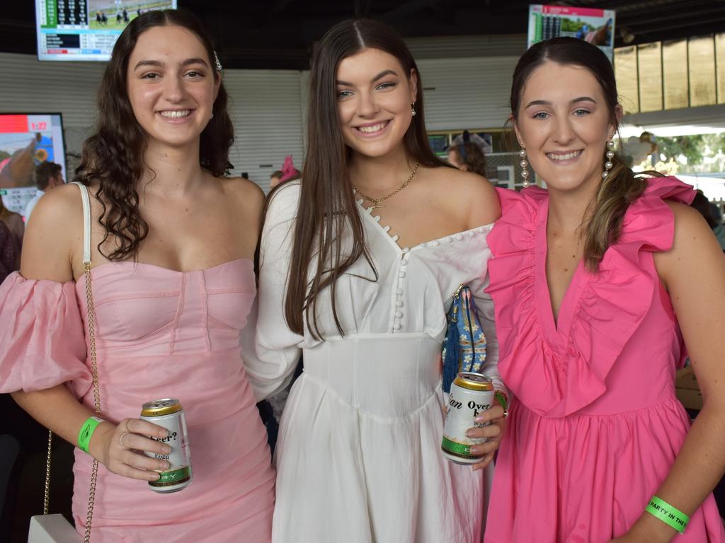 Rose Alexander, Hannah Griffin and Taylah McGhee at The Archer race meeting at Callaghan Park, Rockhampton, on May 7, 2022.
