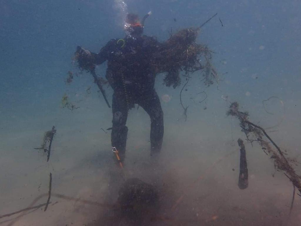 Environmental divers clean up the Gold Coast Seaway. This year they removed 1.75 tonnes from the waterways. Picture: supplied