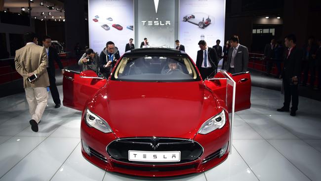 Tesla bulls are betting on some wildly profitable, Apple-like future that they can’t even clearly define.