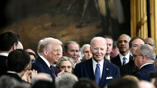 US President Joe Biden looks on as US President-elect Donald Trump arrives during the inauguration ceremony before Trump is sworn in as the 47th US President.