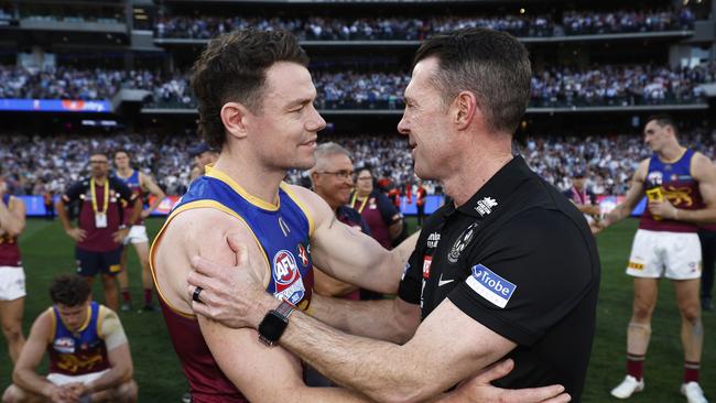 MELBOURNE, AUSTRALIA – SEPTEMBER 30: Lachie Neale of the Lions congratulates Magpies head coach Craig McRae after the 2023 AFL Grand Final match between Collingwood Magpies and Brisbane Lions at Melbourne Cricket Ground, on September 30, 2023, in Melbourne, Australia. (Photo by Daniel Pockett/AFL Photos/via Getty Images)