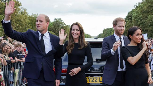 The Prince and Princess of Wales with the Duke and Duchess of Sussex wave at well-wishers on the Long walk outside Windsor Castle. Picture: AFP