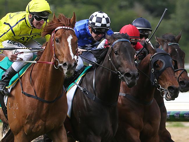 Racing.Kyneton Cup. Race 8. Kyneton Cup.Taiyoo with Brad Rawiller (yellow silks) aboard on the outside squeezes out Tears Of Joy ridden by Ben E Thompson , Tristram's Sun ridden by Dean Holland and Tidy Prophet ridden by Jamie Kah on the rail.Picture : Ian Currie