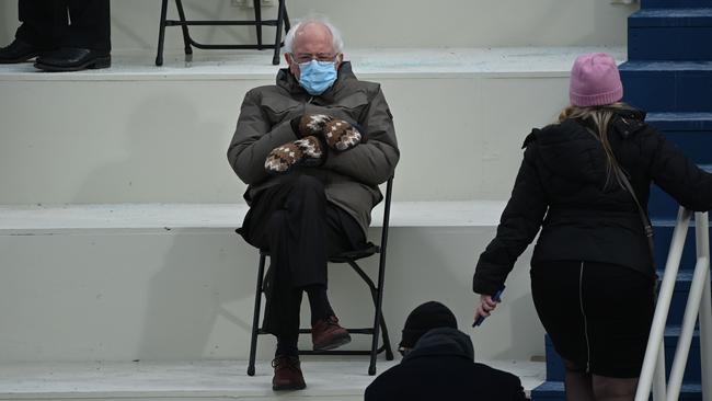 Senator Bernie Sanders sits in the bleachers on Capitol Hill before Joe Biden was sworn in as the 46th US President, at the US Capitol in Washington, DC. Picture: AFP