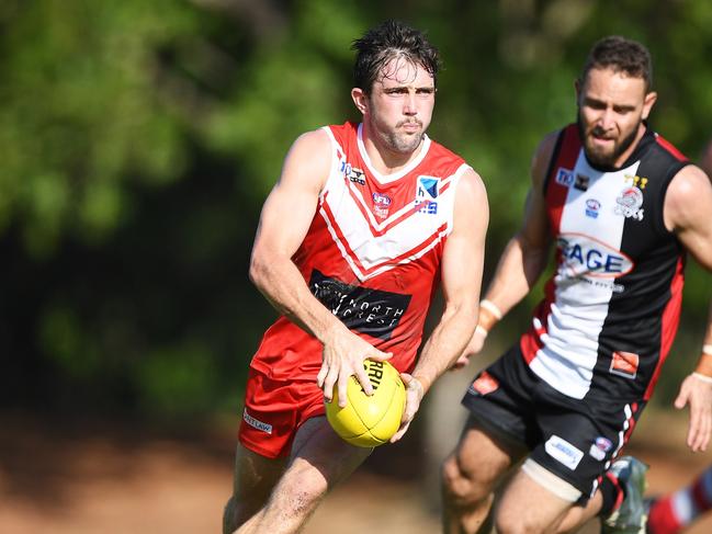 Abe Ankers on the run in Waratah's upset 22-point win over ladder leader Southern Districts at Norbuilt Oval. Picture: AFLNT MEDIA