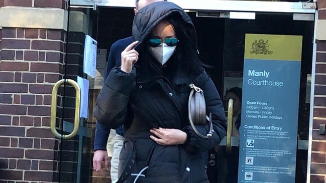 Brawling COVID-19 mother's chatroom offender Mengli Jiang, of Brookvale, leaves Manly Local Court after being sentenced. Picture: Jim O'Rourke