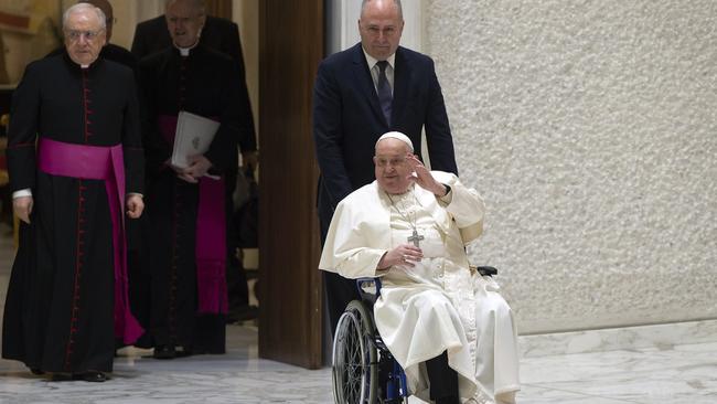 The Pope has used a wheelchair since 2022 and once quipped: 'You govern with your brain not your knee.' Picture: Andreas Solaro/The Times