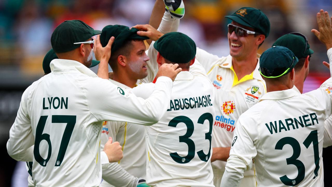 Alex Carey took a world record eight catches behind the stumps on his Test debut.