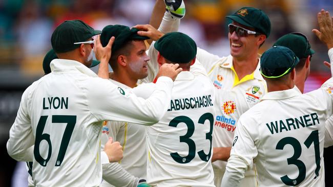 Alex Carey took a world record eight catches behind the stumps on his Test debut.