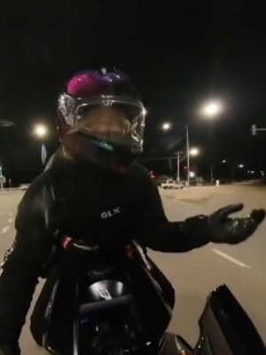 She seems perplexed at the rage. Picture: TravelingBikerBabe/TikTok