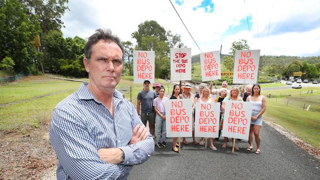 Neighbourhood spokesperson Phil Smith with residents angry about the proposal for a bus depot in their area. Picture: Glenn Hampson.