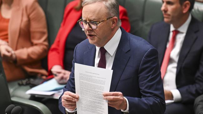 Anthony Albanese holds up the Uluru Statement. Picture: Martin Ollman/NCA NewsWire