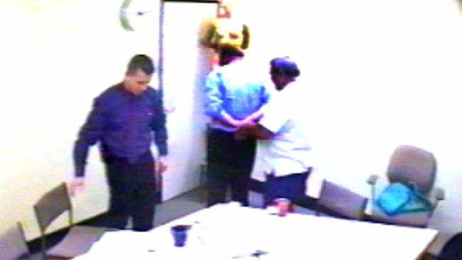 Convicted murderer Francis Michael Fahey demonstrates to detectives how he tied up a victim.