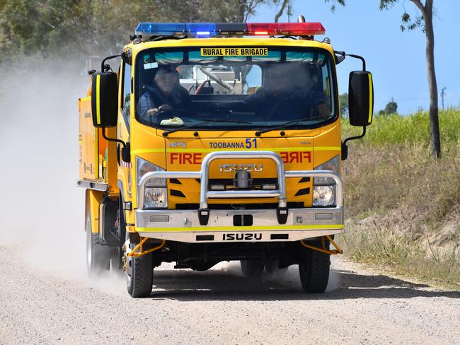 Queensland Rural Fire Brigade heading to a sugar-cane field fire at Toobanna south of Ingham, Hinchinbrook Shire. Please attribute. Picture: Cameron Bates