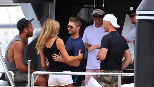 Buddy Franklin, Michael Clarke, Anthony Bell and Karl Stefanovic enjoying drinks on Anthony Bell boat Ghost II. They were later join by ex model Laura Csortan.