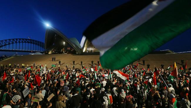 Palestine supporters rally outside the Sydney Opera House following the Hamas insurgency.