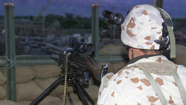 An Australian SAS soldier surveys a hillside while on guard duty in Afghanistan in April, 2002. Picture: File