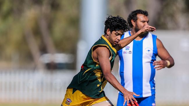 Thomas Swan has kept his form after switching the green and yellow of Pioneer for blue and white of South Alice Springs. Picture: Charlie Lowson / AFLNT Media