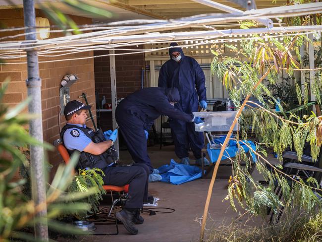 Police search the house where Cleo Smith was found. Picture: Colin Murty