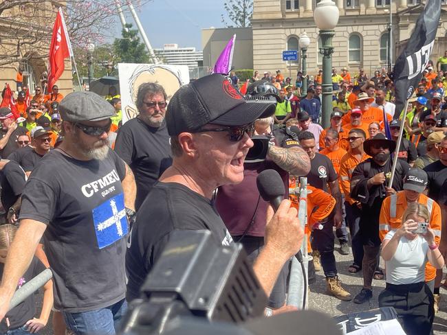 Michael Ravbar speaking at the rally in Brisbane. Picture: Steve Pohlner