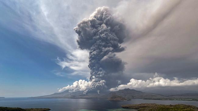 TOPSHOT - This aerial handout picture taken on November 9, 2024 and released on November 10, 2024 by the National Disaster Mitigation Agency shows the eruption of Mount Lewotobi Laki Laki as seen from the Eputobi rest area in East Flores, East Nusa Tenggara. (Photo by Handout / National Disaster Mitigation Agency / AFP) / RESTRICTED TO EDITORIAL USE - MANDATORY CREDIT AFP PHOTO / National Disaster Mitigation Agency - NO MARKETING - NO ADVERTISING CAMPAIGNS - DISTRIBUTED AS A SERVICE TO CLIENTS