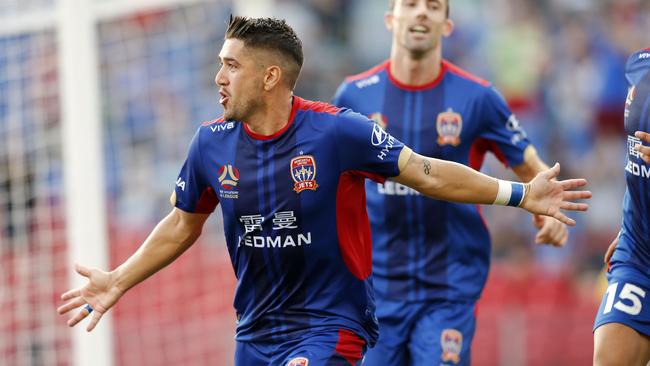 Dimitri Petratos scored a late penalty to help the Jets down Adelaide United