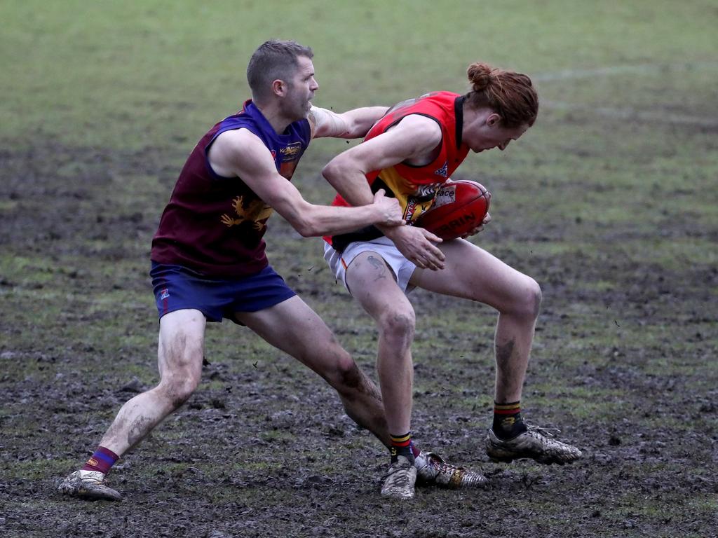 South Yarra and Hallam do battle in the mud in Southern Football League Division 4.