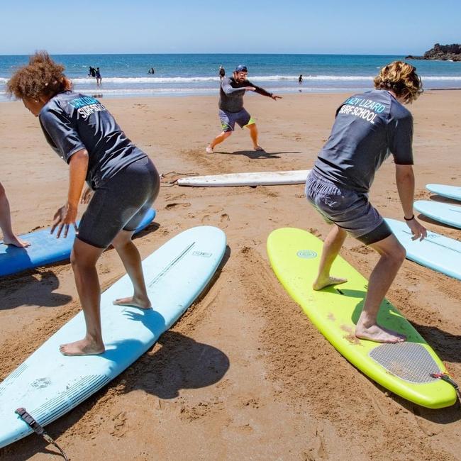 A Lazy Lizard Surf School group session hosted by co-owner Nathan "Squali" down at Agnes Water Main Beach. Picture: Murray Cornish