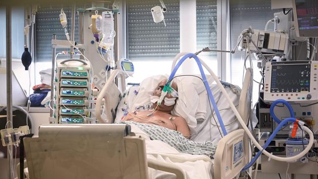 A patient infected with Covid-19 lies in the intensive care unit in a hospital in France. Picture: AFP