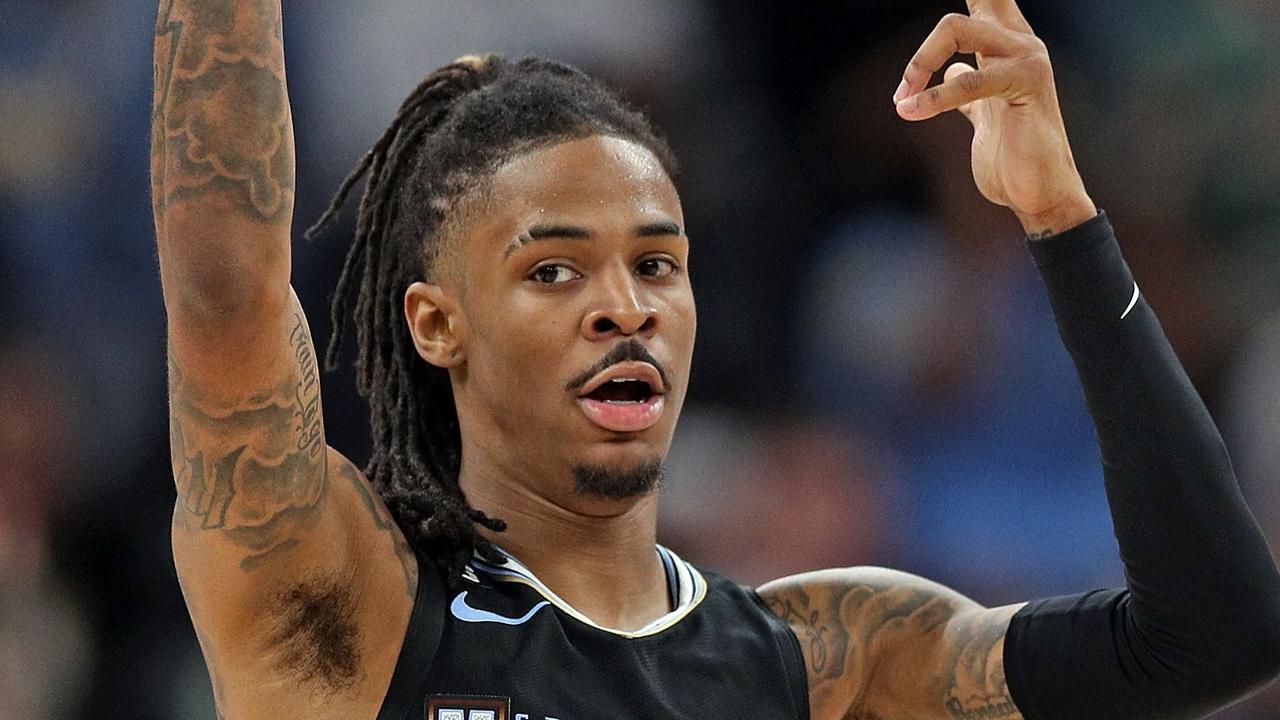 MEMPHIS, TENNESSEE – FEBRUARY 28: Ja Morant #12 of the Memphis Grizzlies reacts during the second half against the Los Angeles Lakers at FedExForum on February 28, 2023 in Memphis, Tennessee. (Photo by Justin Ford / GETTY IMAGES NORTH AMERICA / Getty Images via AFP)