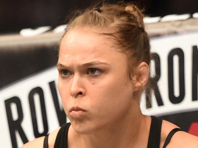 LOS ANGELES, CA - FEBRUARY 28: Ronda Rousey enters the Octagon in her UFC women's bantamweight championship bout against Cat Zingano during the UFC 184 event at Staples Center on February 28, 2015 in Los Angeles, California. (Photo by Harry How/Getty Images)