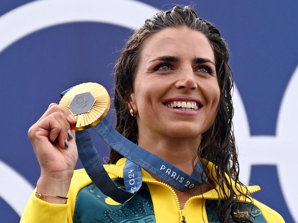 Gold medallist Jessica Fox smiles on the podium during the medal ceremony after the women's kayak single final of the canoe slalom competition at Vaires-sur-Marne Nautical Stadium in Vaires-sur-Marne during the Paris 2024 Olympic Games on July 28. Olivier Morin/AFP