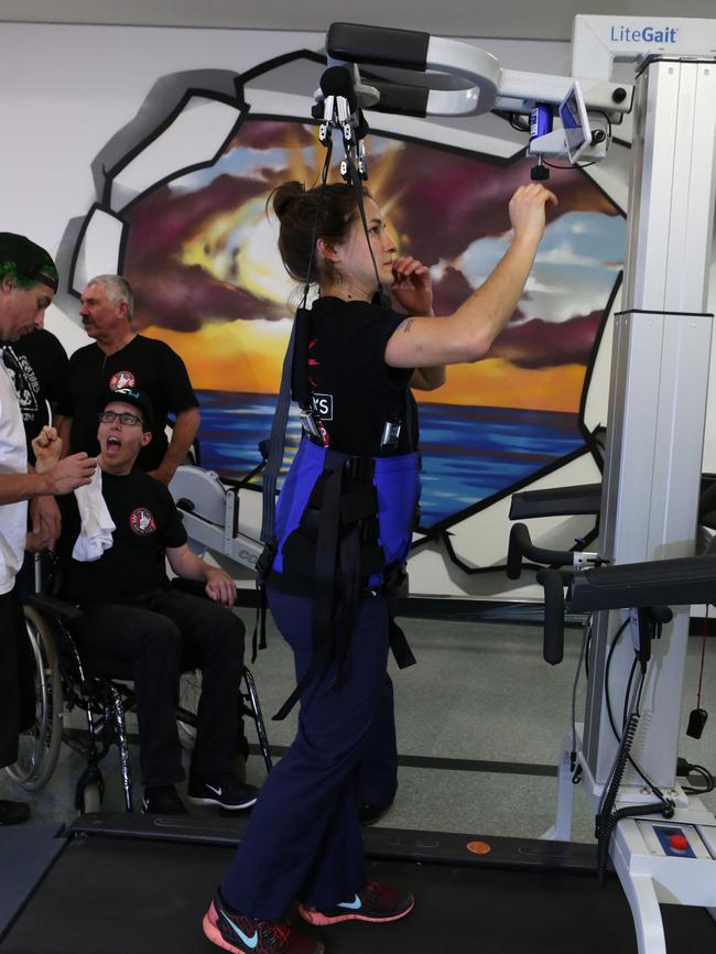 Physiotherapist Ashley Rabie tries out the equipment that Luke Stojanovic’s donation helped buy. Picture: Tim Clapin