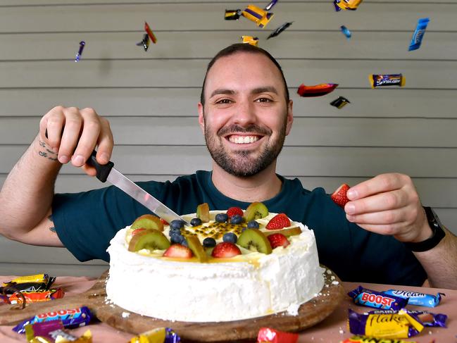 Brandon Collins enjoys his Pavlova even if prices are going up.Friday November 4, 2022. Picture, John Gass