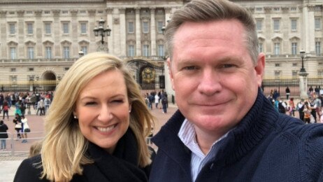 Doyle outside Buckingham Palace with colleague Michael Usher in the lead-up to Meghan Markle and Prince Harry's wedding coverage. Picture: Supplied/Twitter