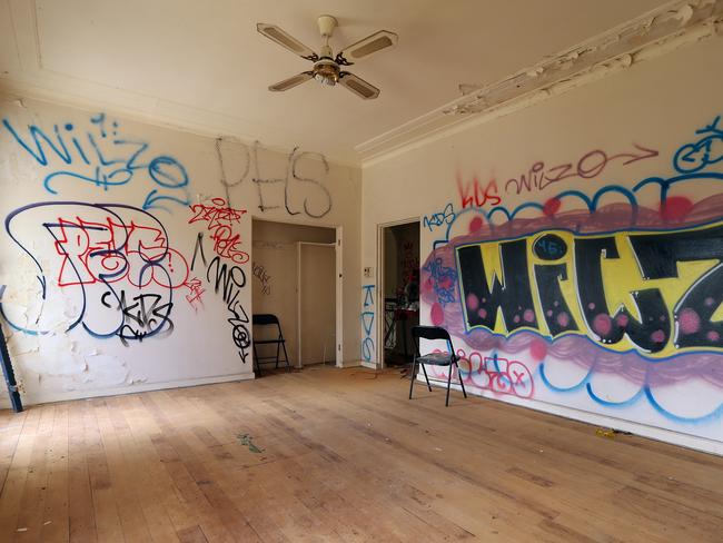 Graffiti marked the walls of the mansion.