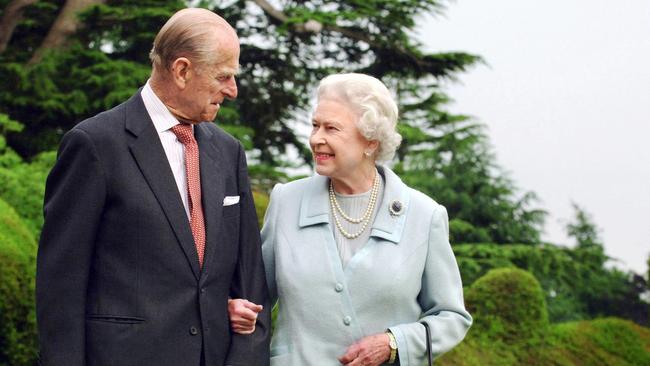 Queen Elizabeth and Prince Philip recreate in 2007 the pose of their honeymoon picture taken 40 years earlier. Picture: Reuters.