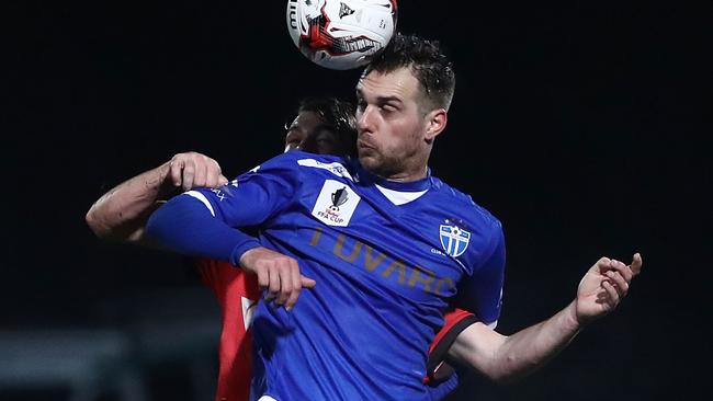 Milos Lujic competes in the air against Edgeworth Eagles. Picture: Getty Images