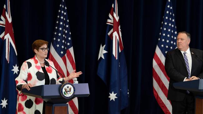 US Secretary of State Mike Pompeo listens to Foreign Minister Marise Payne following the AUSMIN talks in Washington. Picture: AFP