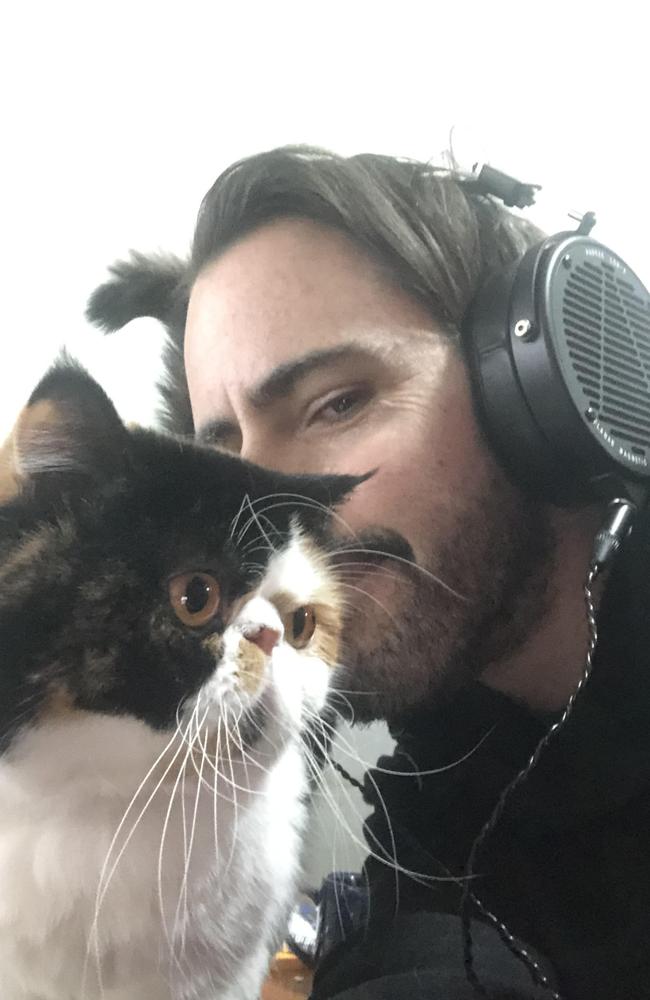 Ryan Allen with his cat, Smooch, 2, who is being treated for Feline infectious peritonitis (FIP) with the new drug remdesivir. Picture: Supplied