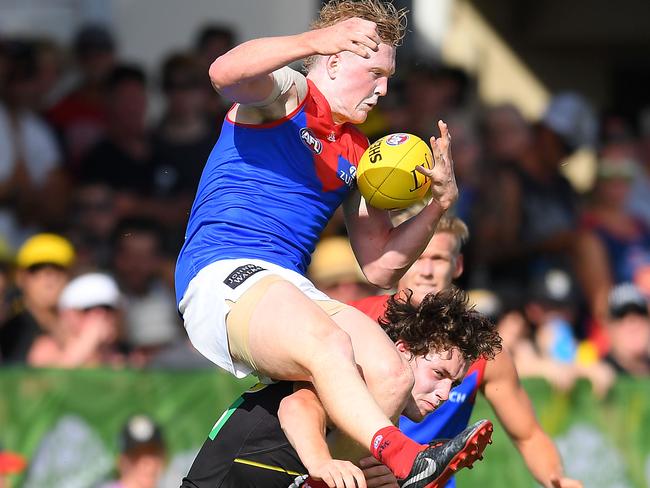 Clayton Oliver crashes into Richmond’s Riley Collier-Dawkins. Picture: Getty Images