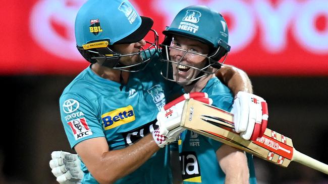 *APAC Sports Pictures of the Week - 2021, February 1* - BRISBANE, AUSTRALIA - JANUARY 29: Jimmy Peirson and Joe Burns of the Heat celebrate victory during the Big Bash League Eliminator Final match between the Brisbane Heat and the Adelaide Strikers at The Gabba, on January 29, 2021, in Brisbane, Australia. (Photo by Bradley Kanaris/Getty Images)