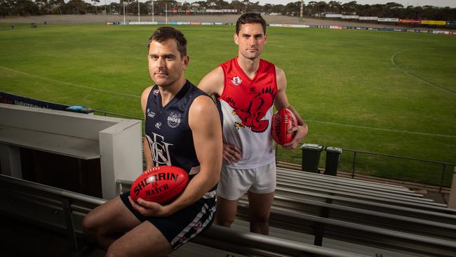 Noarlunga’s Tom Caudle with Flagstaff Hill co-captain David Kearsley ahead of last year’s SFL grand final. The teams will battle again in this season’s flag decider. Picture: Brad Fleet