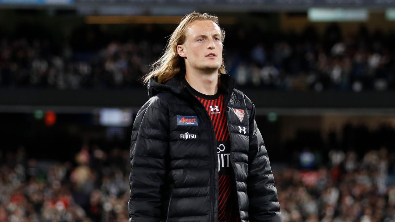 Mason Redman is in doubt for Essendon’s clash against North Melbourne. Picture: Dylan Burns/AFL Photos via Getty Images