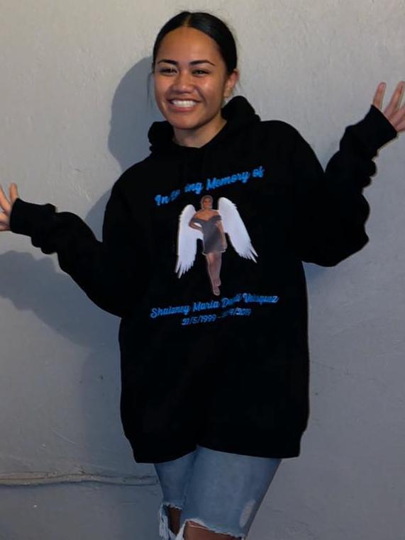 Faith Patolo-Vitale wearing a hoodie with Shalaney Velasquez’ picture.