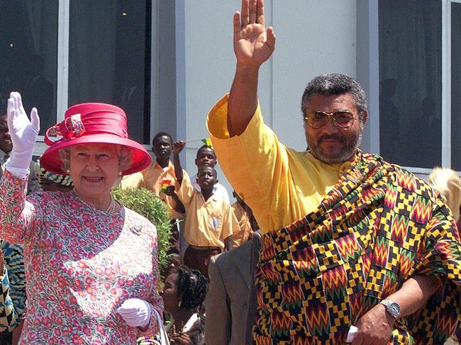 In this file photo taken on November 08, 1999 Britain's Queen Elizabeth II (L) and Ghana’s President Jerry Rawlings (R) wave to the crowd. Picture: AFP