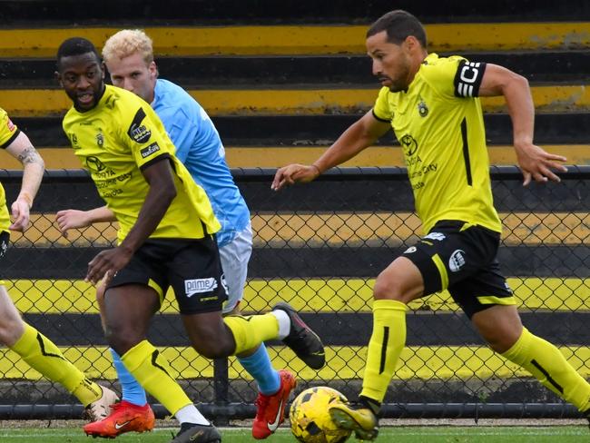 Heidelberg players on the attack. Picture: Sally Tsalikidis