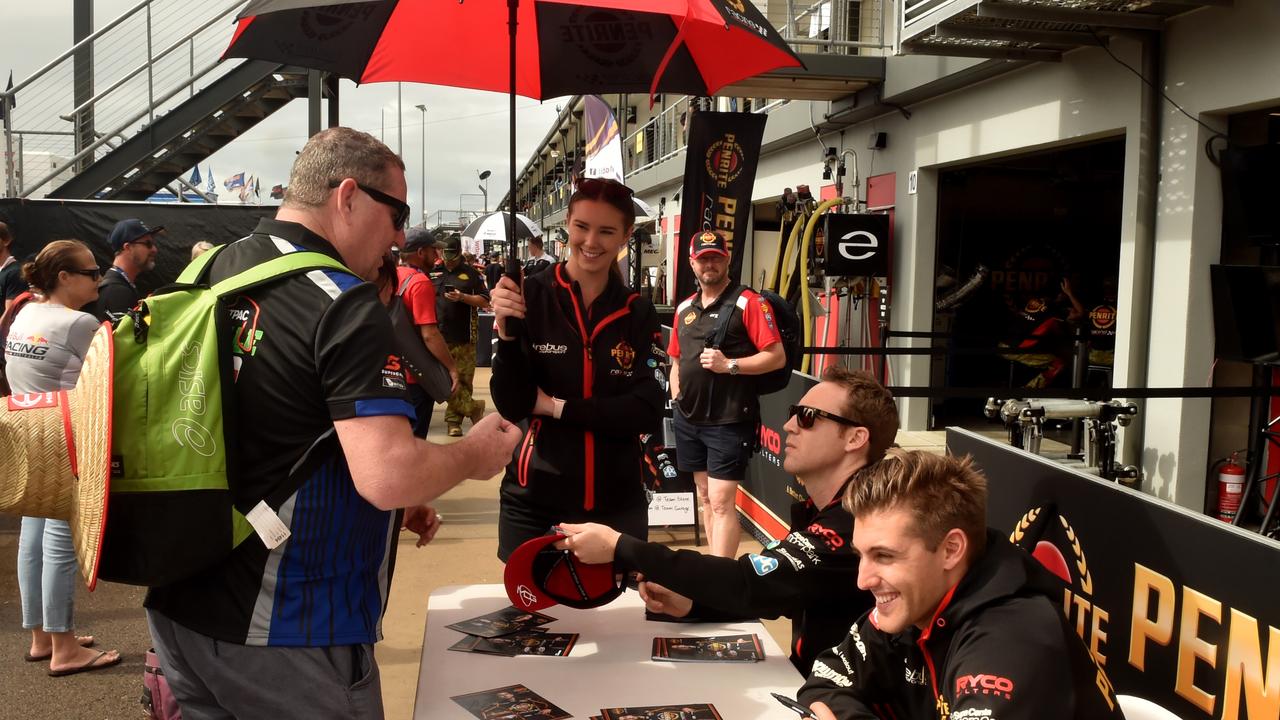 Watpac Townsville 400 Day One. Socials. Supercar drivers David Reynolds and Anton de Pasquale sign autographs. Picture: Evan Morgan