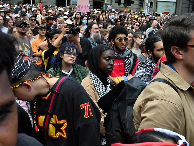 Protesters were also seen wearing keffiyeh scarfs in support of Palestine at Invasion Day rally. Picture: Luis Enrique Ascui