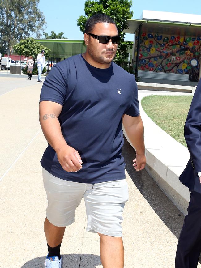 A supporter of the 15-year-old charged with murder leaves court. AAP Image/Richard Gosling